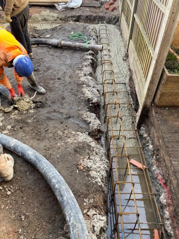 Concrete with concrete pump for domestic footings.