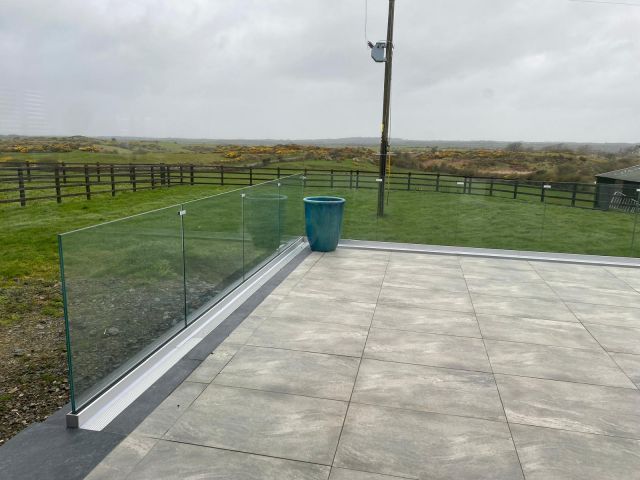 Toughened laminated glass on an external glass balustrade