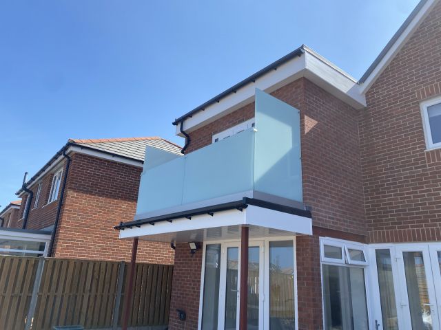 Toughened laminated glass with frosted interlayer for privacy balcony